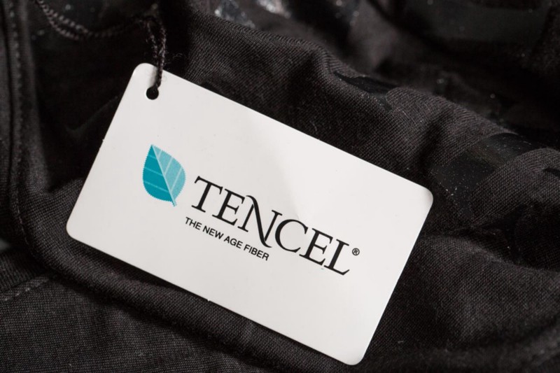 white custom hang tag on black shirt