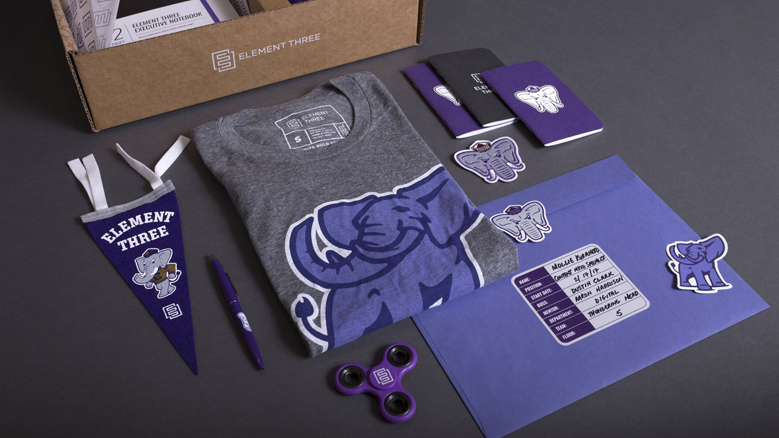swag merchandise and box flat lay