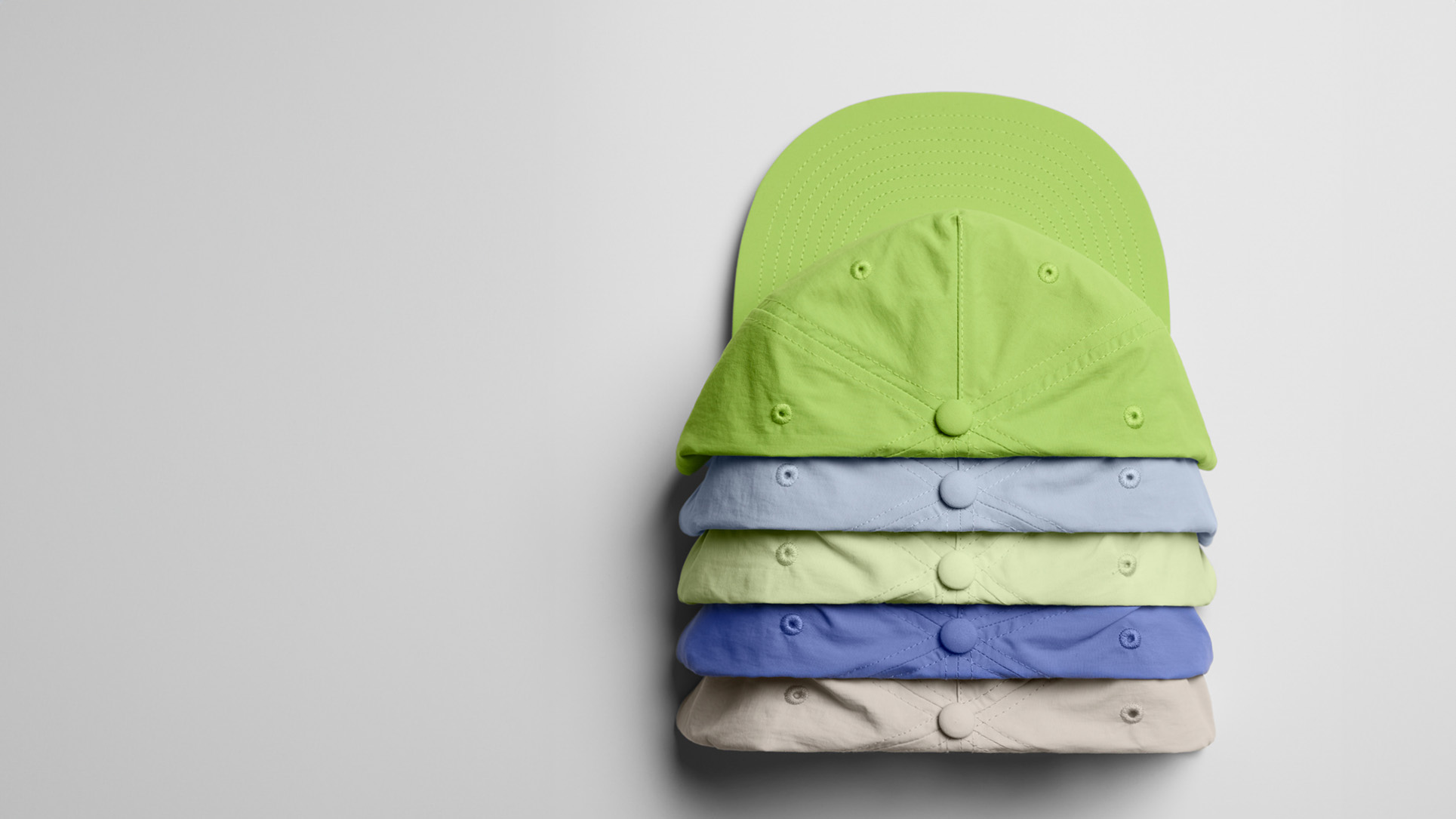 Comparing Custom Hat Designs: The AS Colour Finn Five Panel Cap 1103 vs. The AS Colour Surf Cap 1114